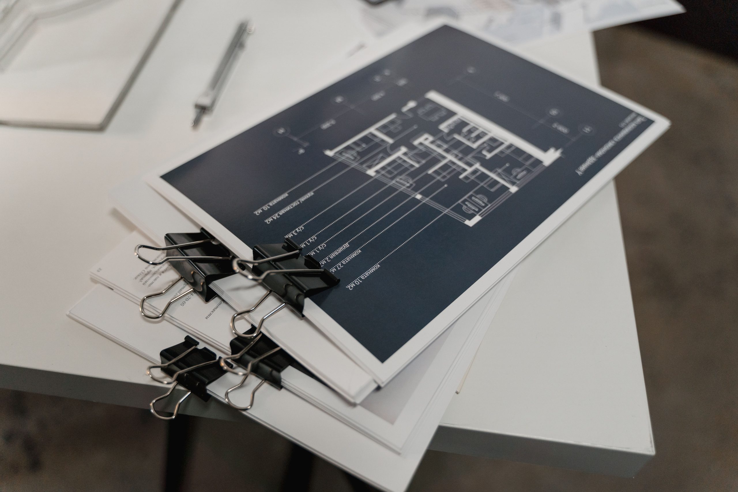 Technical documents on a desk.